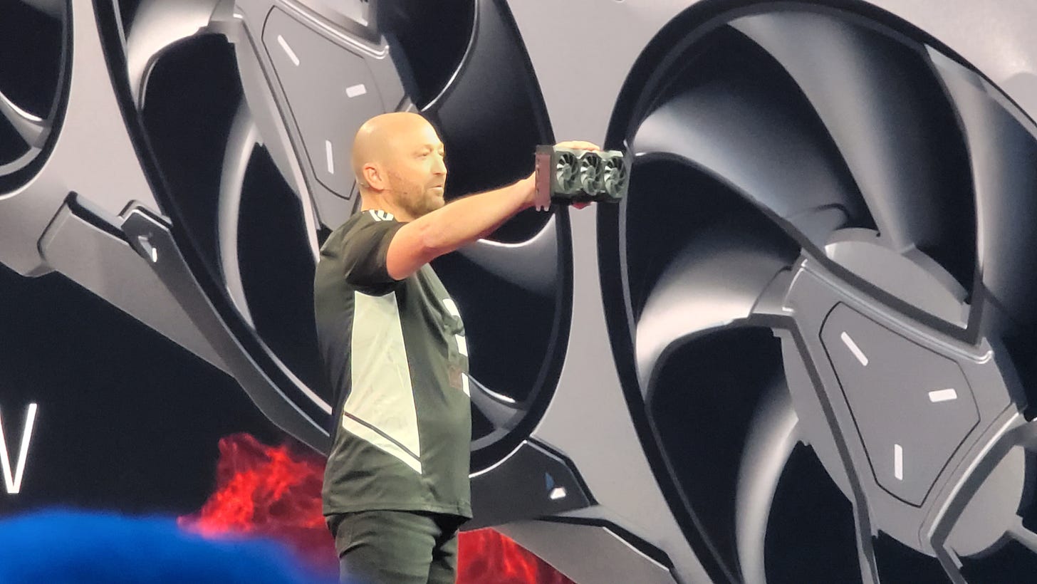 Man holding up a graphics card