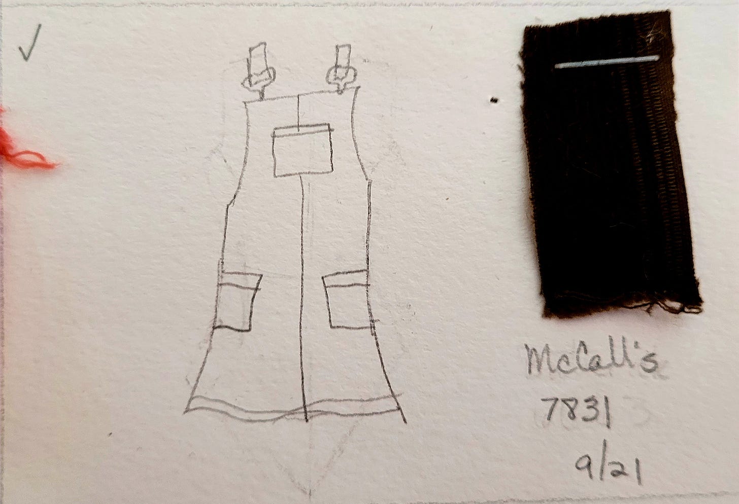A closeup of a cell featuring a line drwing an overalls dress with a brown corduroy fabric sample and says McCall's 7831 9/21