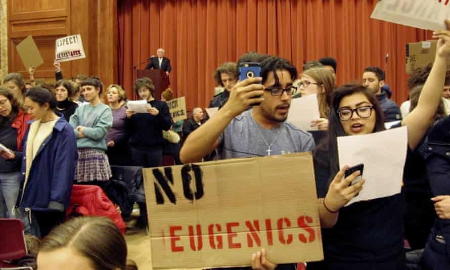 Middlebury College students turn their backs to Charles Murray, who they call a white nationalist, during his lecture.