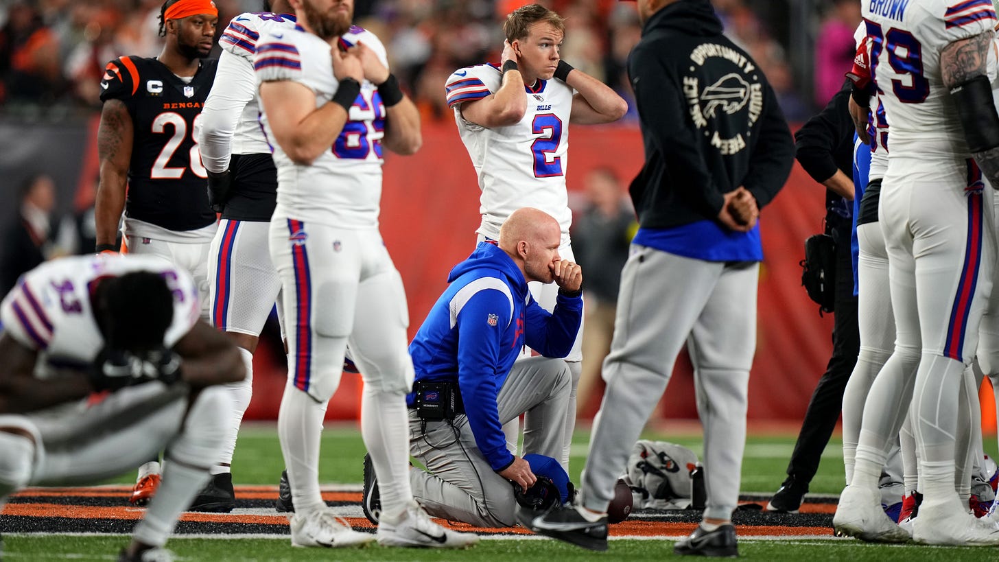 Buffalo Bills head coach Sean McDermott takes a knee is as Buffalo Bills safety Damar Hamlin is tended to on the field following a collision in the first quarter of a Week 17 NFL game against the Cincinnati Bengals, Monday, Jan. 2, 2023, at Paycor Stadium in Cincinnati. Play was suspended. 
