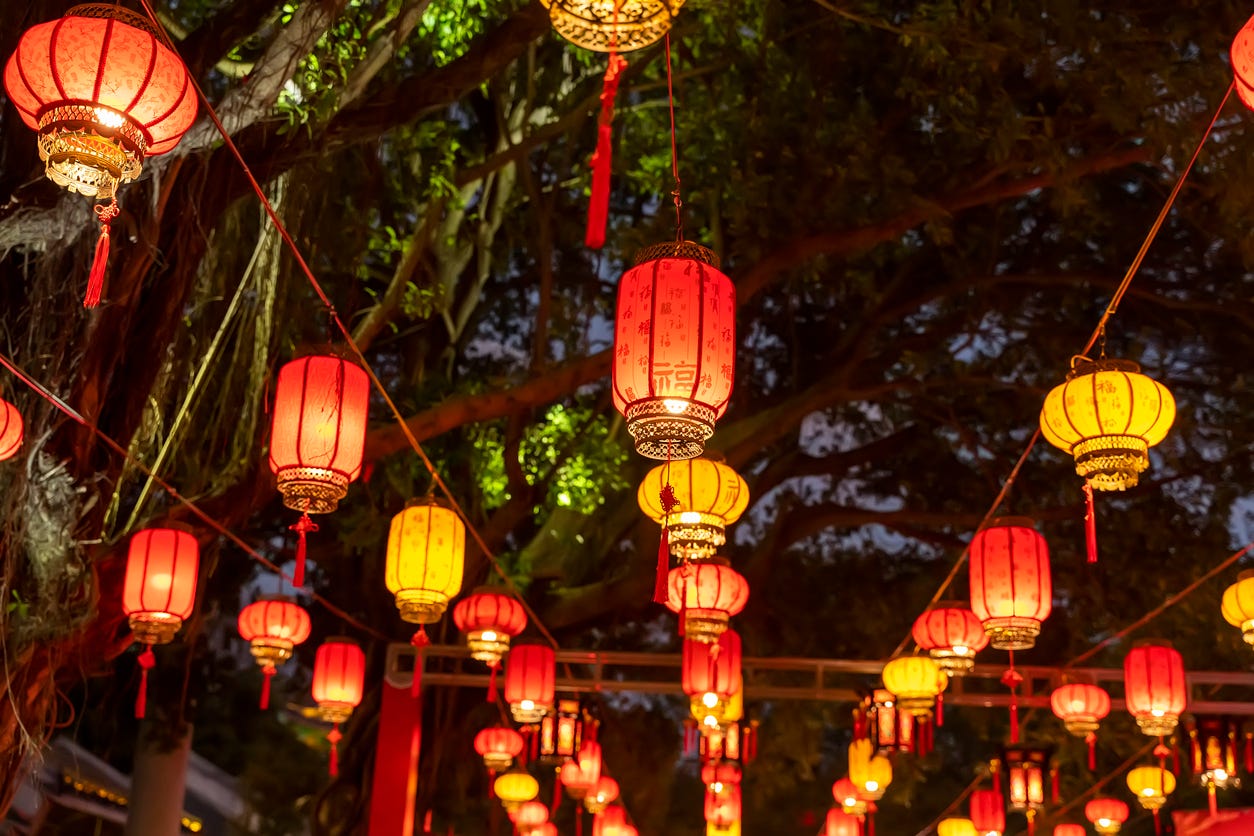 Chinese paper lanterns. Paper protects flame from wind.