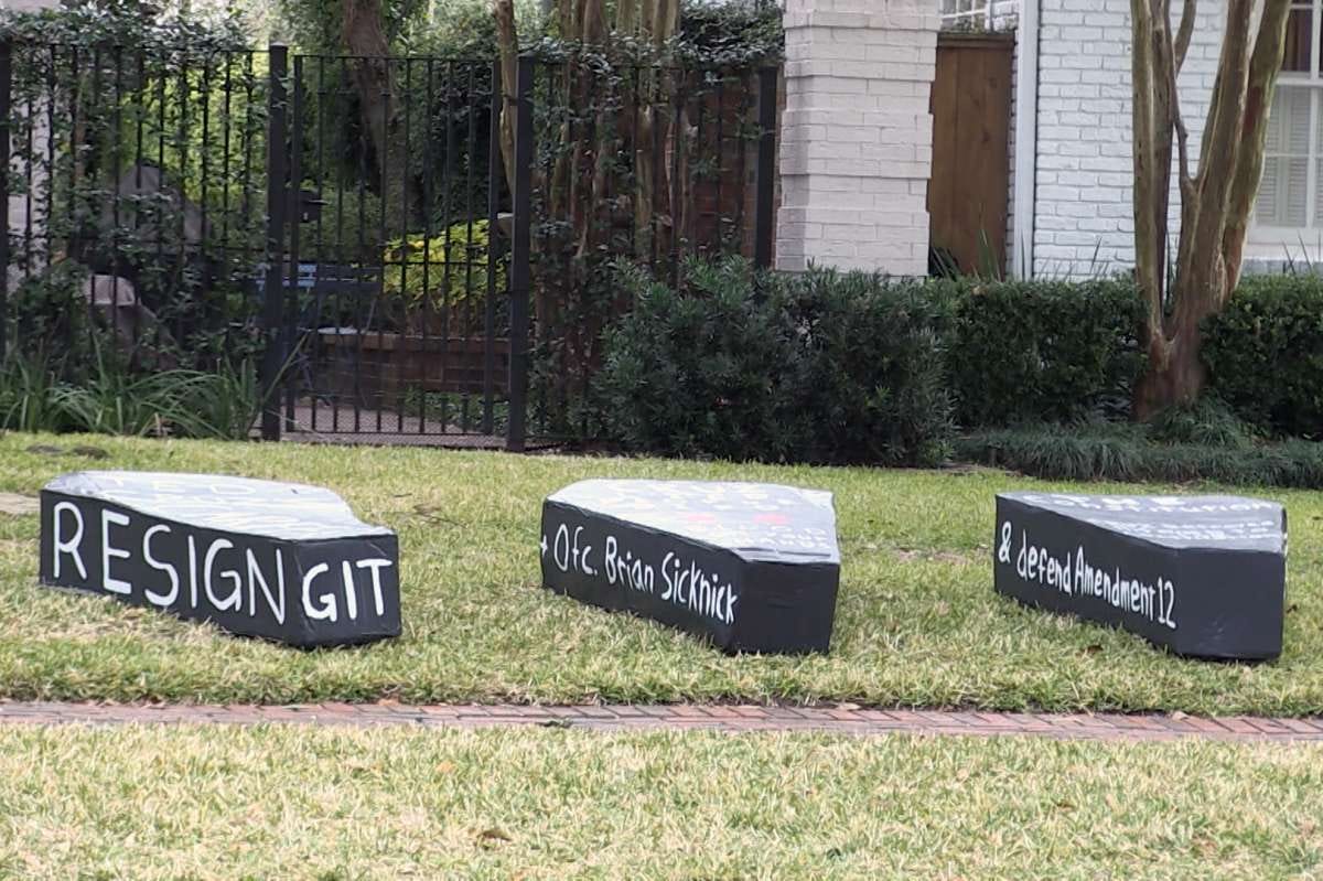 A small group of Houstonians left three coffins on Sen. Ted Cruz's lawn.