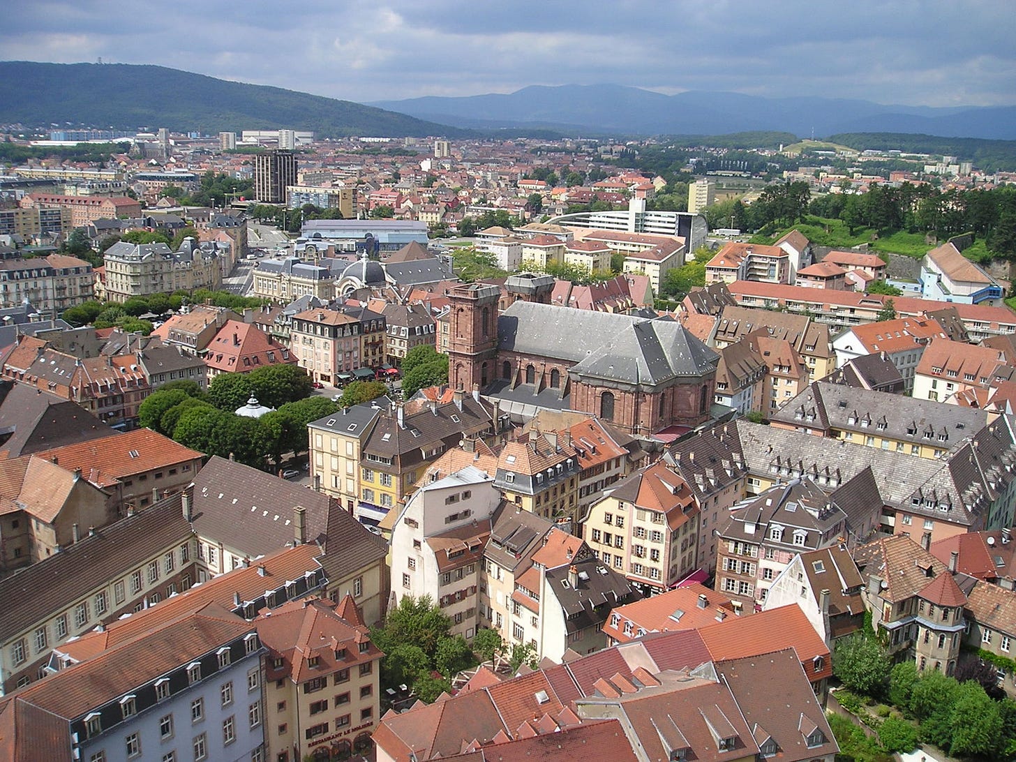 An aerial view of Belfort with the Cathedral of Saint-Christophe in the foreground