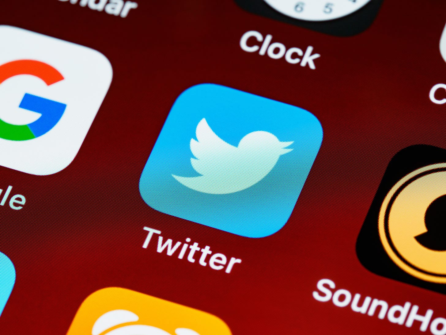 Twitter app logo on phone screen