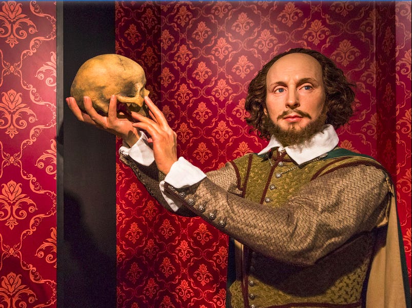 Shakespeare holding up a skull