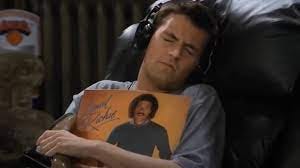 Chandler Bing Hugging a Record | Know Your Meme