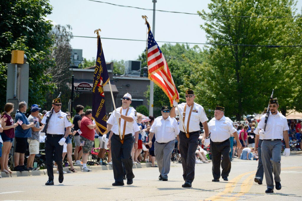 Members of VFW Post 725 start off the parade.