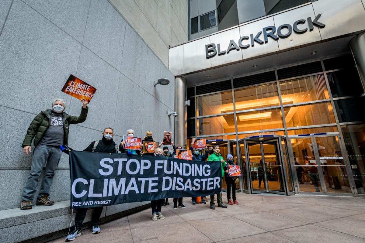 Climate protestors gather in front of BlackRock's offices.