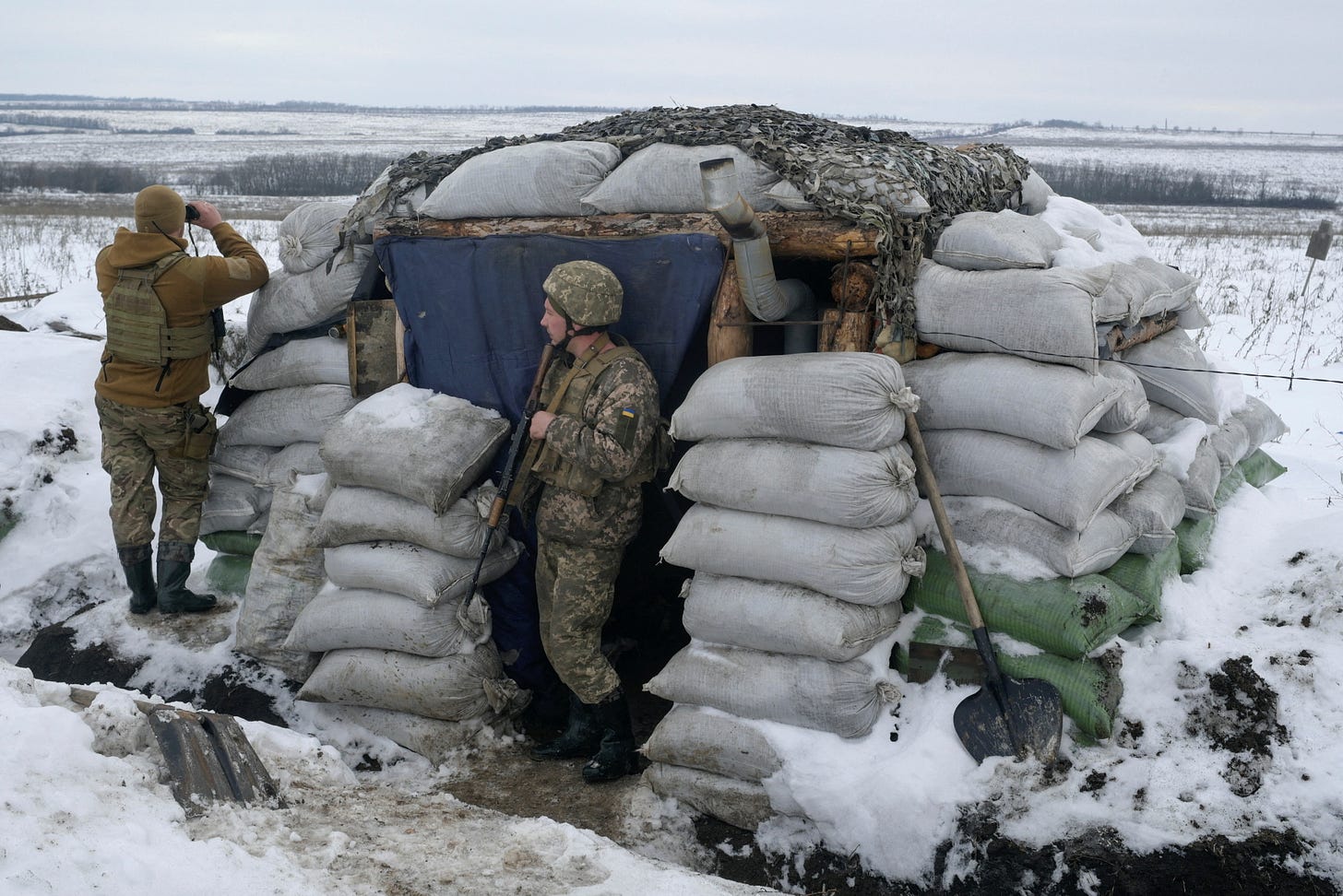 In snowy trenches, Ukrainian soldiers vow to stand firm against Russia |  Reuters