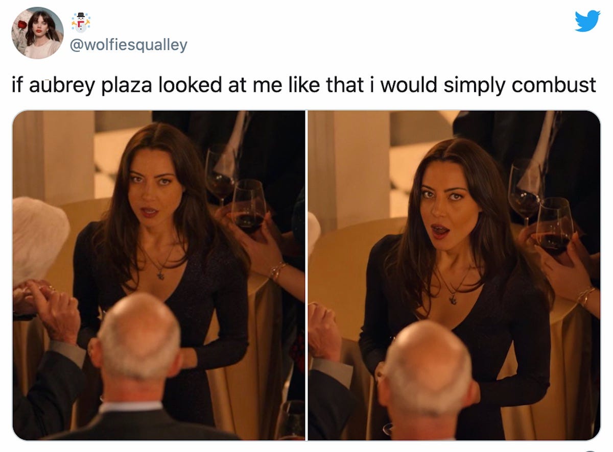 A screenshot of a tweet featuring two images of Aubrey Plaza in the movie Happiest Season. She is looking at the camera with an intense expression. The text of the tweet reads "if Aubrey Plaza looked at me like that I would spontaneously combust".