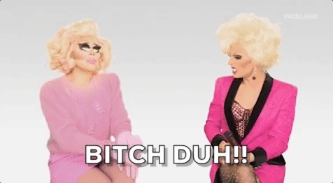 GIF: Trixie Mattel and Katya are both dressed in pink, as Trixie exclaims, "Bitch duh!"