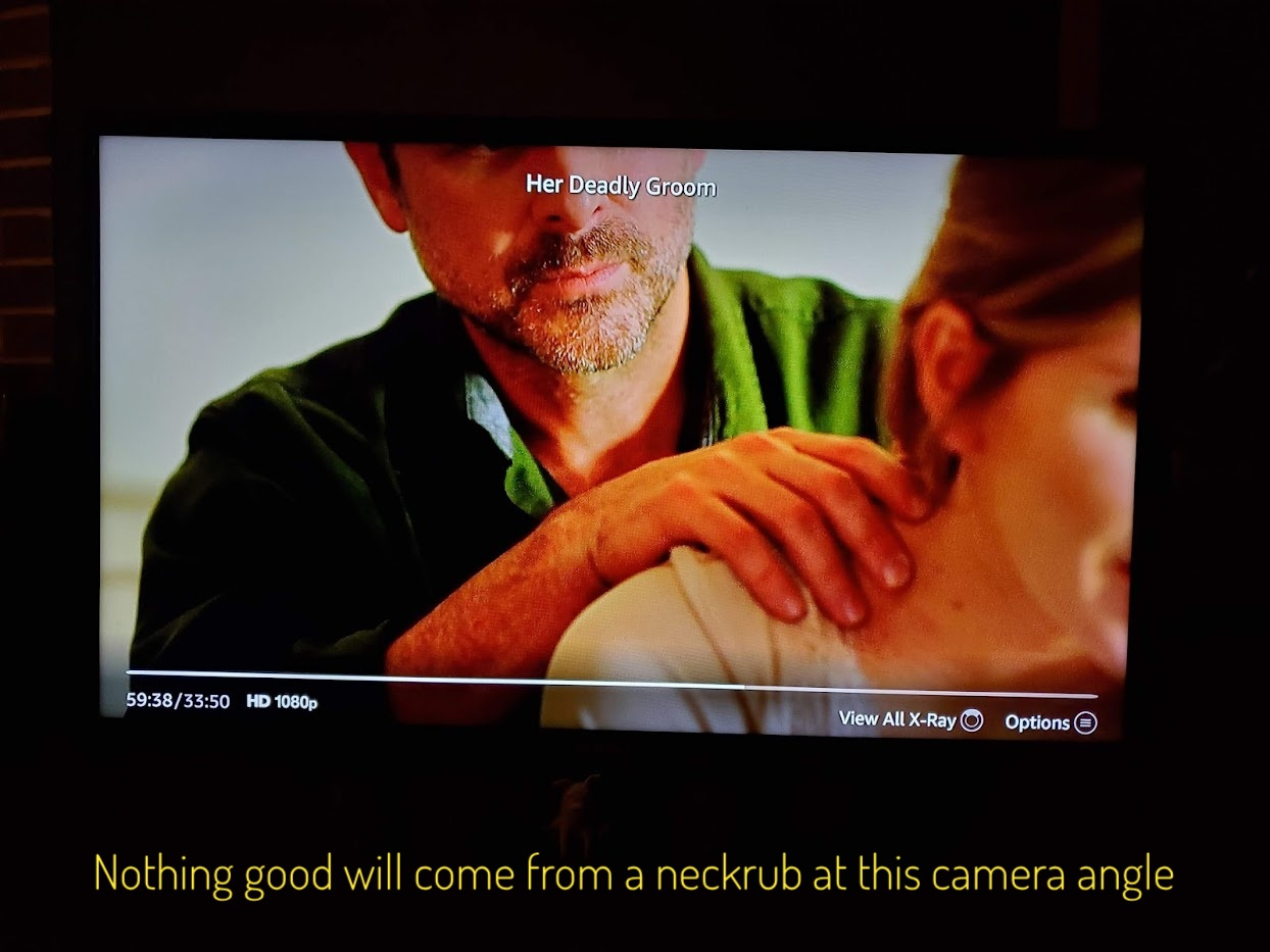 A very zoomed-in angle of Vincent's hands on Alison's neck, captioned "Nothing good will come from a neckrub at this camera angle"