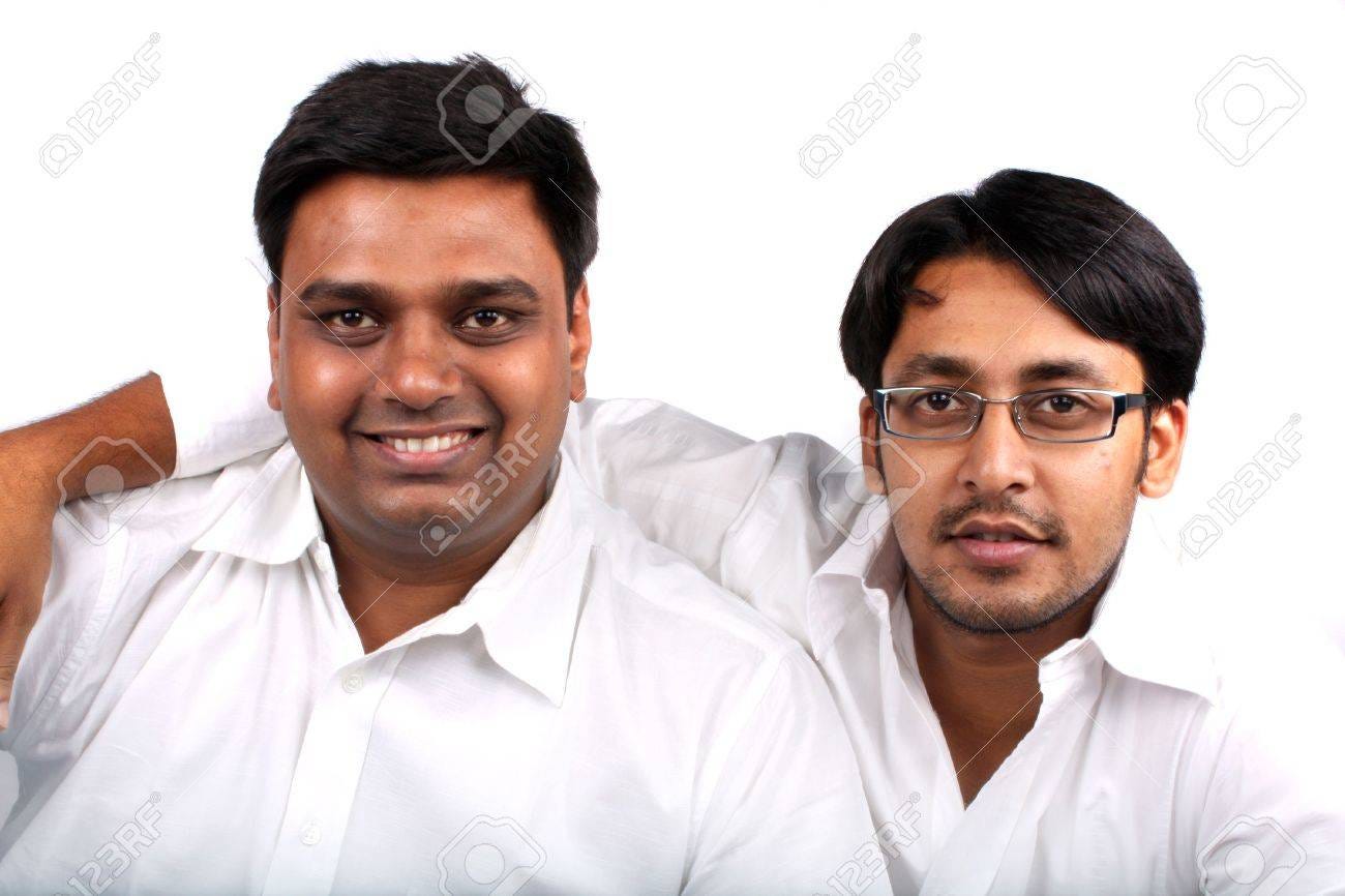 A Friendship Portrait Of Two Young Handsome Indian Guys, On A White  Background Stock Photo, Picture And Royalty Free Image. Image 5455789.