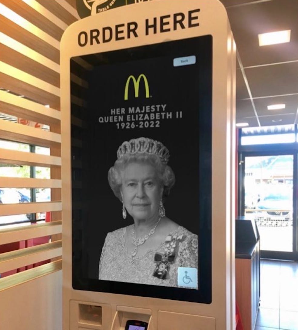 The Queen in a McDonalds kiosk