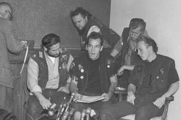 Sonny Barger, center, with other members of the Hells Angels at a news conference in Oakland, Calif., in 1965. He was among the motorcycle club&rsquo;s most visible members for decades.