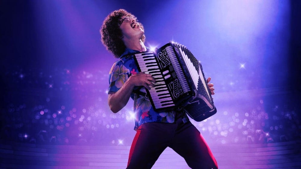 Weird Al Yankovic playing accordion