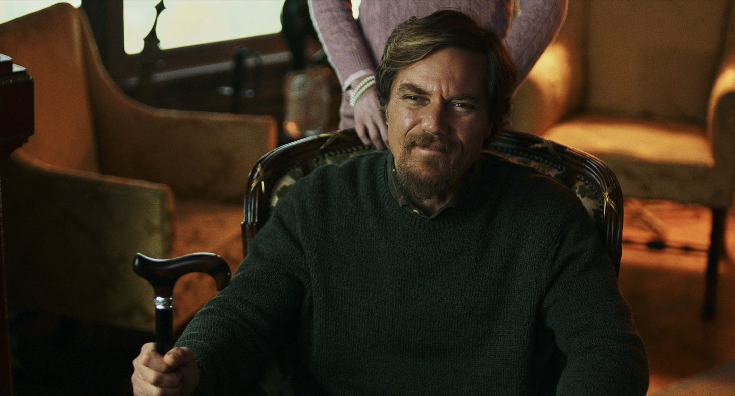 Michael Shannon as Walt Thrombey wearing a dark green pullover in KNIVES OUT.