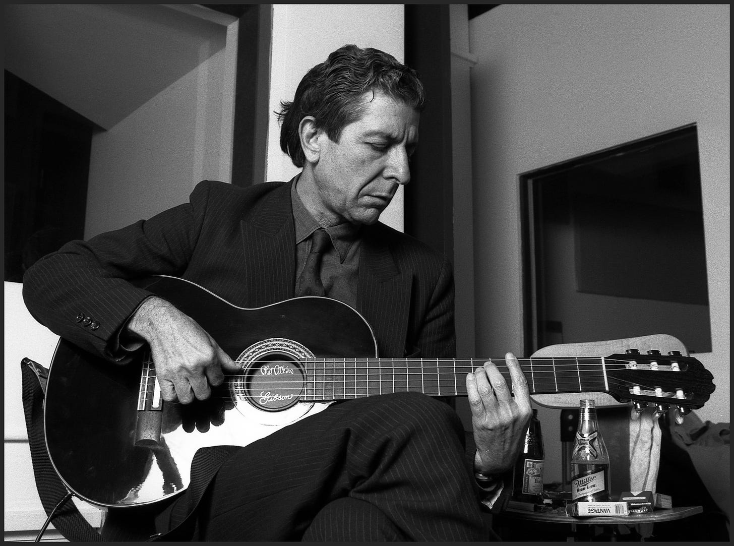 Leonard Cohen, Canadian poet and singer-songwriter, plays some of his songs in a small recording studio, lower Manhattan, New York, mid 1980s.