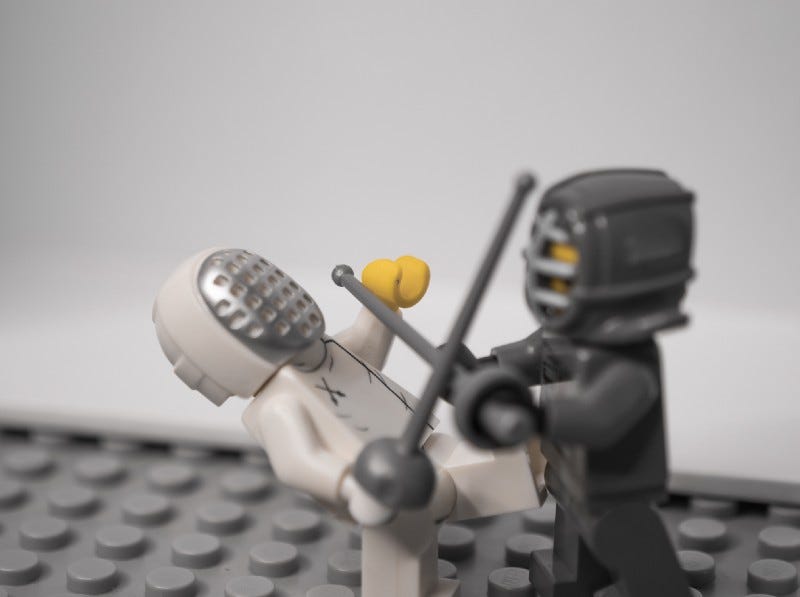 A lego of people fighting