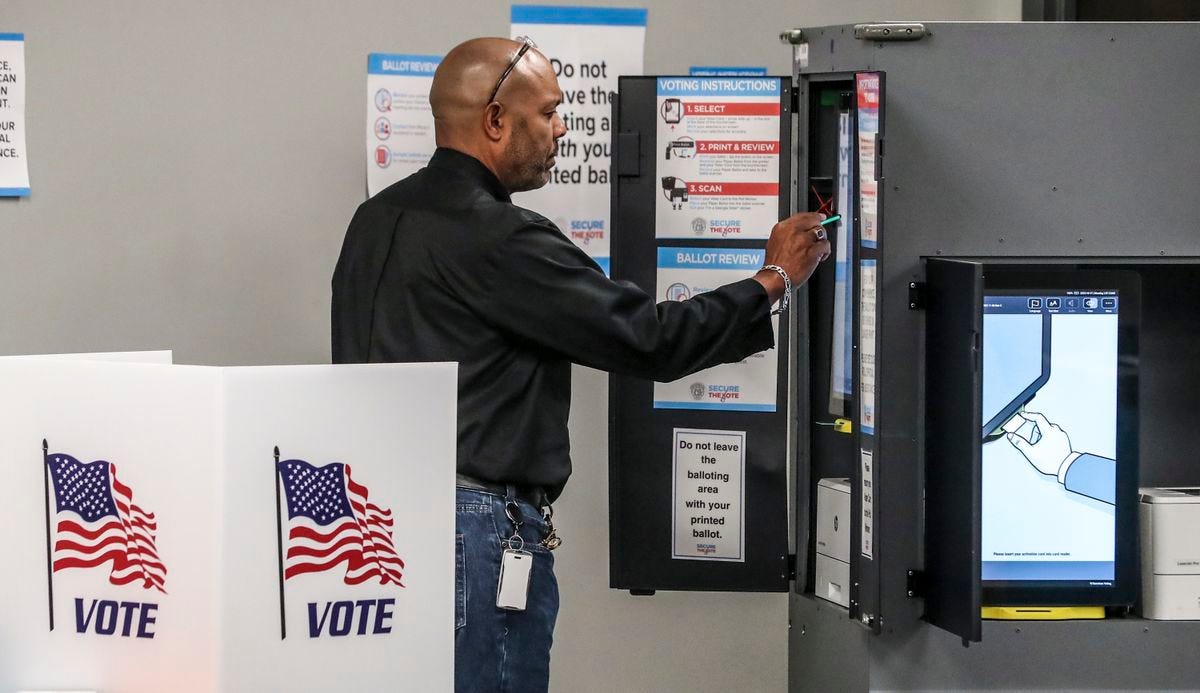 Turnout on first day of Georgia early voting breaks midterm record | The  Spokesman-Review