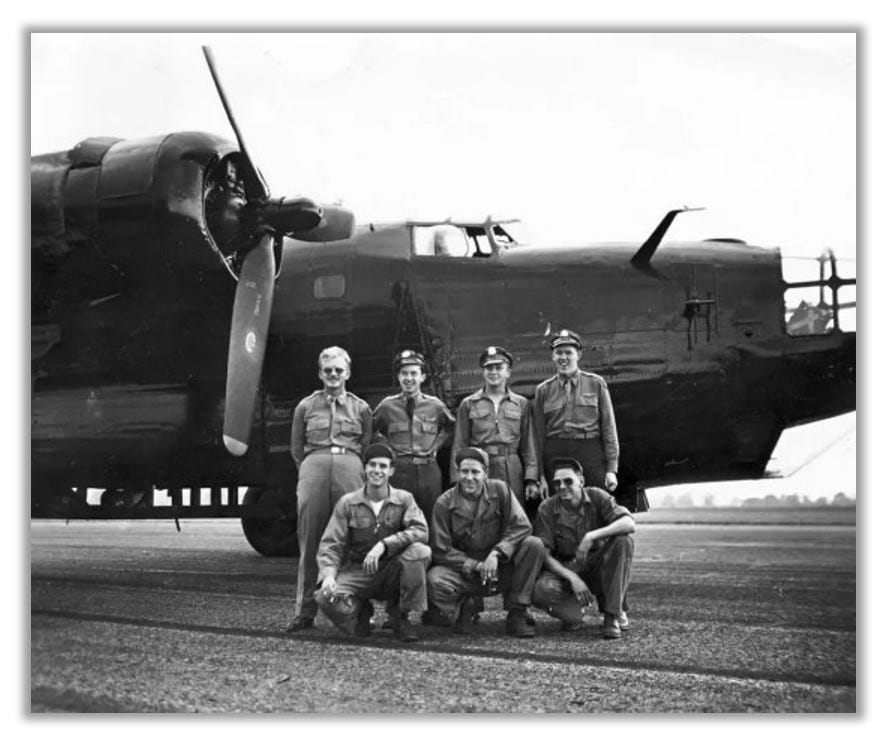 A carpetbagger crew poses with their plane.