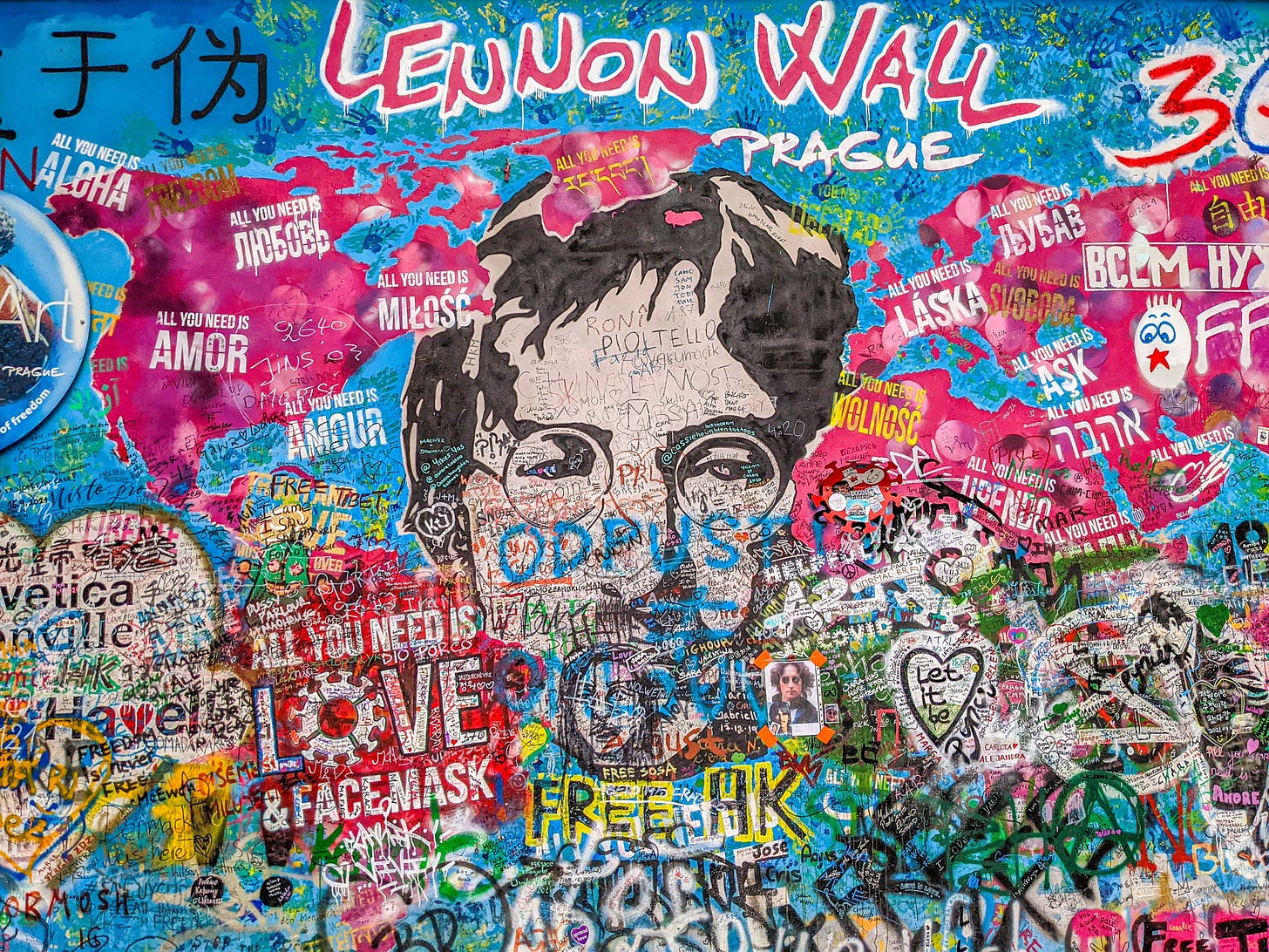 The Lennon Wall is a famous mural space in Lesser Town filled with all kinds of colorful art.