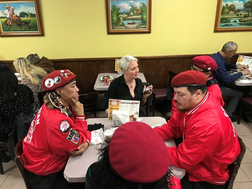 Anne Kadet interviewing The Guardian Angels in a Queens restaurant