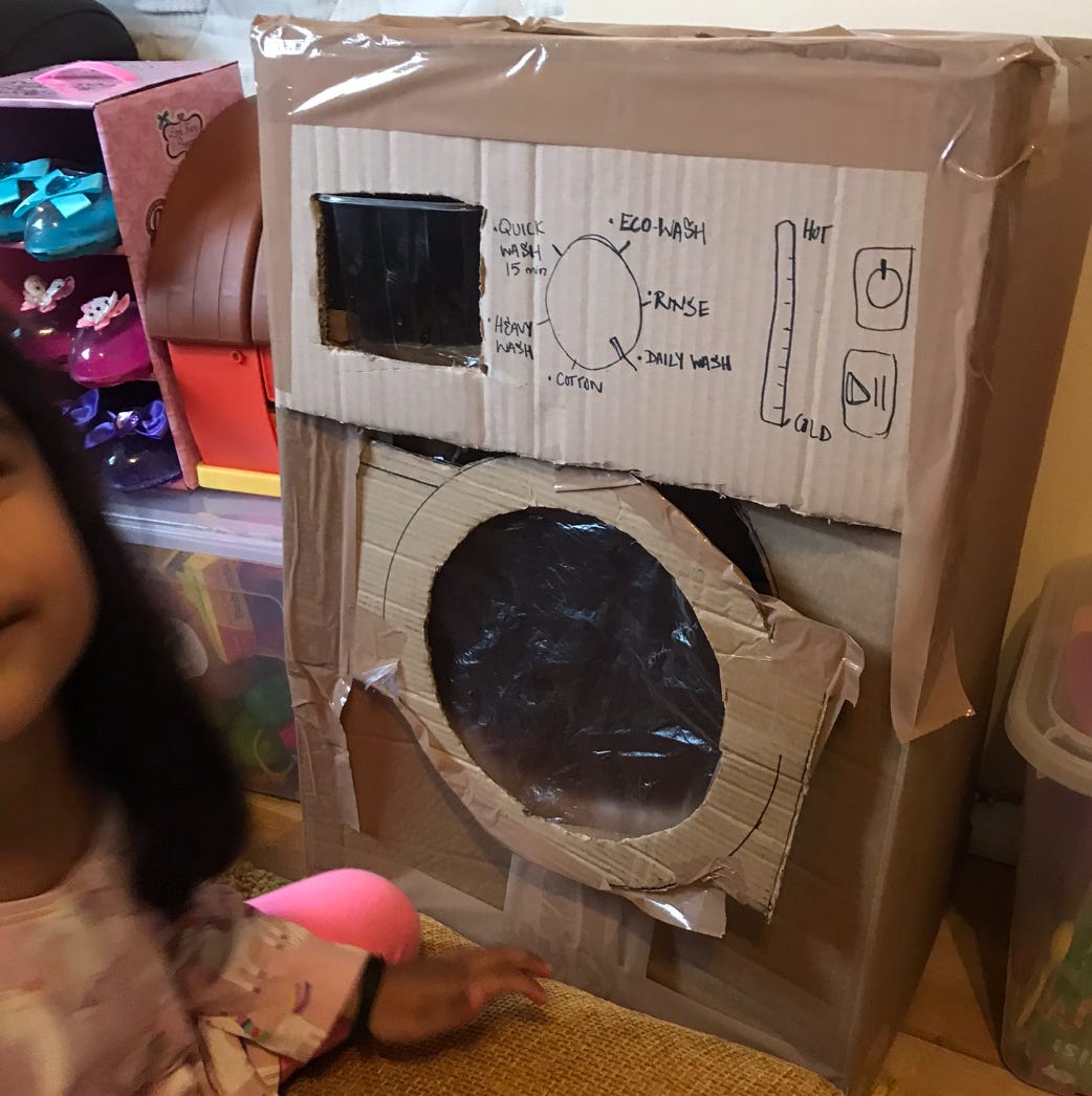 A cardboard washing machine made by Zara Saleem and her family