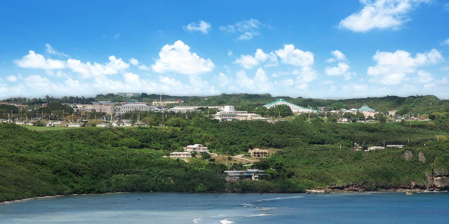 This image shows the University of Guam's campus from a vantage point on the ocean near the university's Marine Lab. This image shows the University of Guam's campus from a vantage point on the ocean near the university's Marine Lab.
