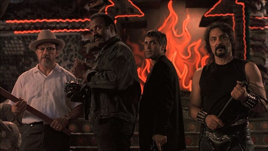From left, Harvey Keitel, Fred Williamson, George Clooney and Tom Savini star in 1996's "From Dusk Till Dawn," a Dimension Films release.