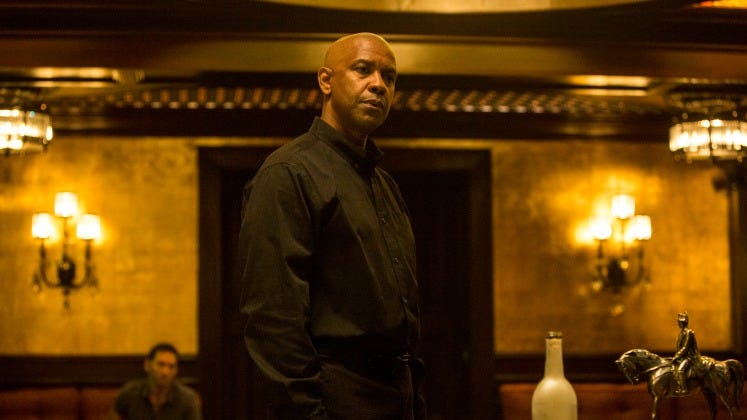 McCall (DENZEL WASHINGTON) talks to Slavi in Columbia Pictures' THE EQUALIZER.