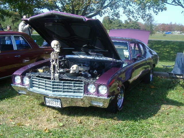 Decorating their 1970 Buick for the season.