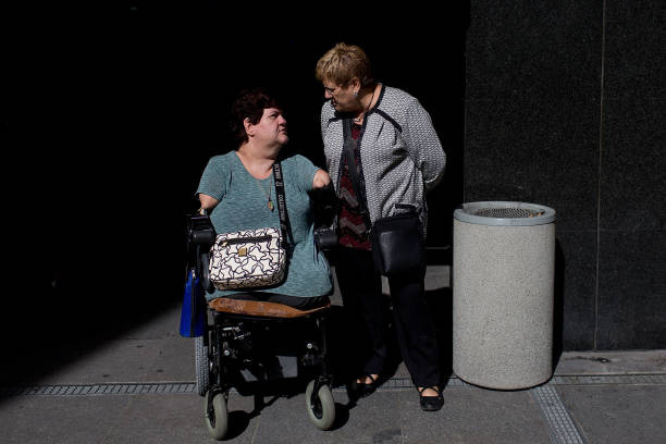 Thalidomide victim speaks with her mother outside the court after the first day of a trial involving the German pharmaceutical company Gruenenthal,...