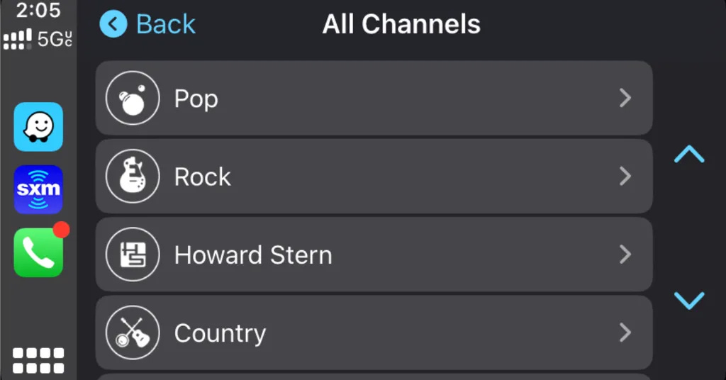 The SiriusXM streaming radio app is displayed on a car radio running Apple's CarPlay operating system.