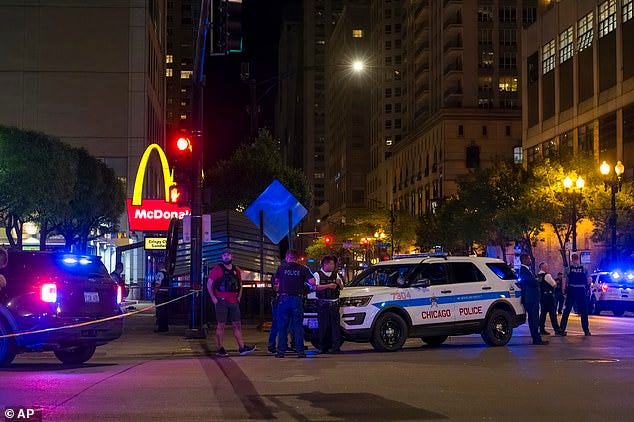 Two dead and eight injured after shooting outside a McDonald's in Chicago |  Daily Mail Online