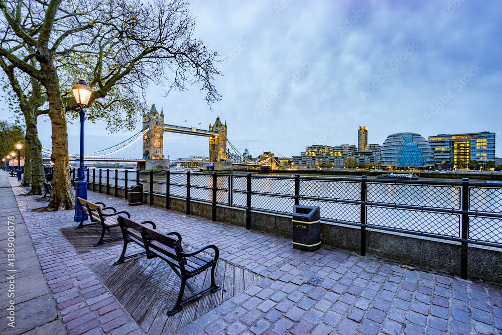 Empty bench and Tower Bridge viewed from Tower of london side of the Thames  river Stock Photo | Adobe Stock