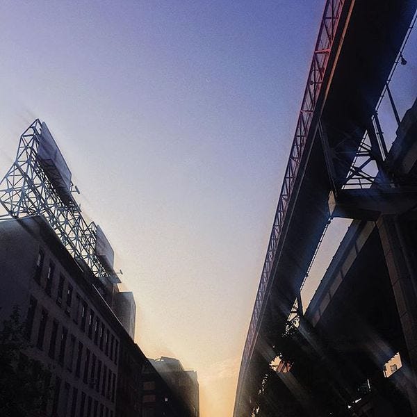 Turning Into the Sunrise at the Foot of the Williamsburg Bridge