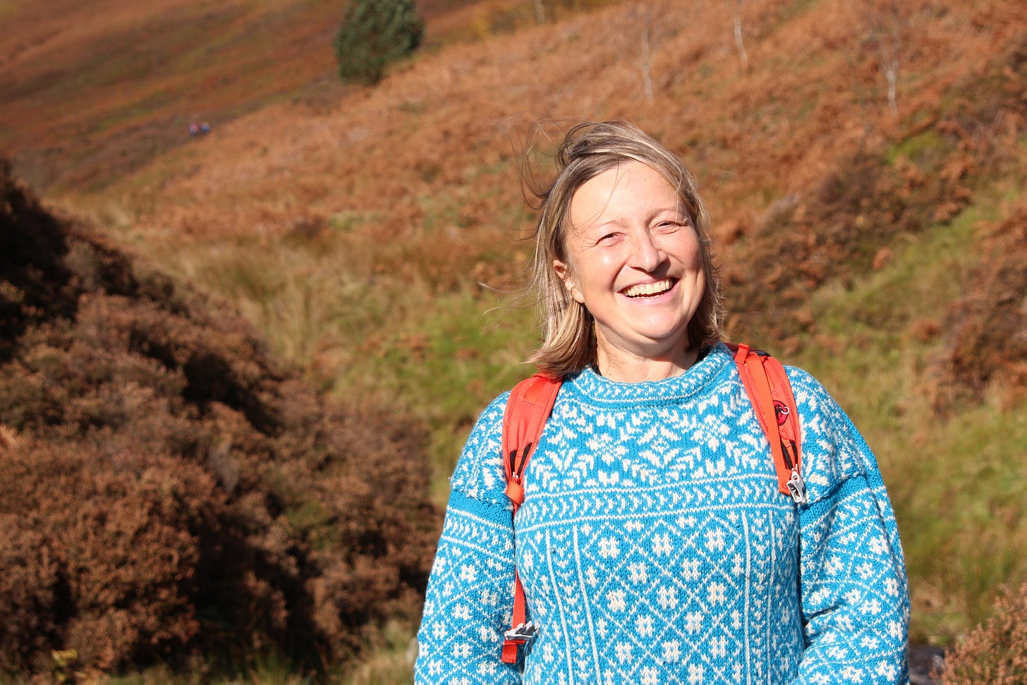 Helen Turton standing next to Grindsbrook in Edale
