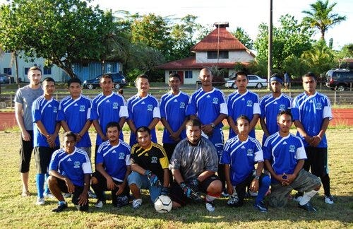 Paul Watson (far left) and the Pohnpei football team