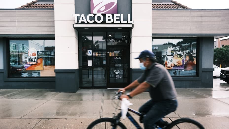 A Taco Bell restaurant stands along a Queens street on July 21, 2021 in New York City.