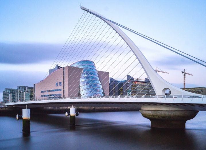 Dublin's Docklands area including the Samuel Beckett bridge and the Convention Centre.