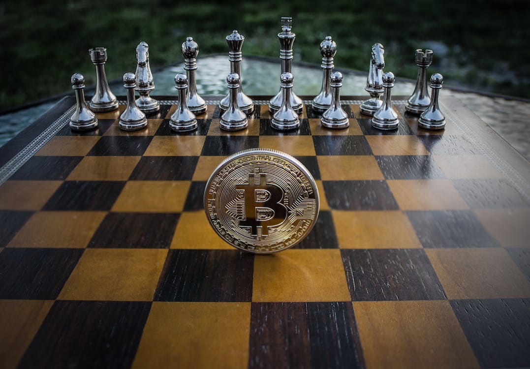 Free Close-up Photography of Coin on Chessboard Stock Photo