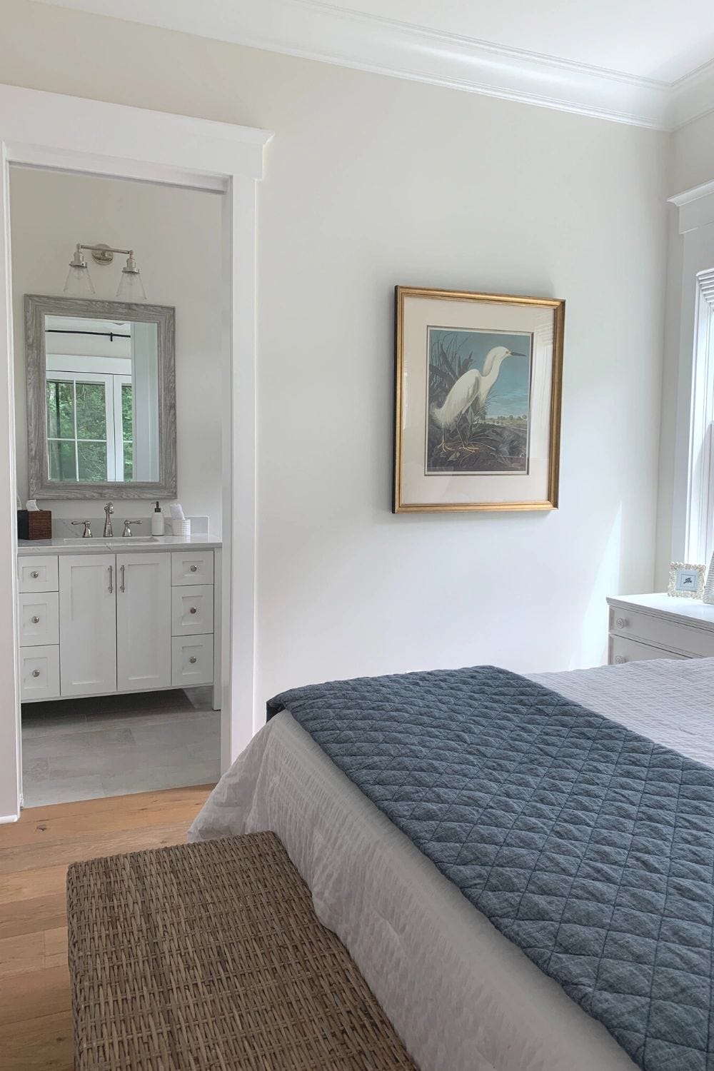 Our guest bedroom with an attached bathroom has a cool coastal feel and came together through about 100 design decisions. :)