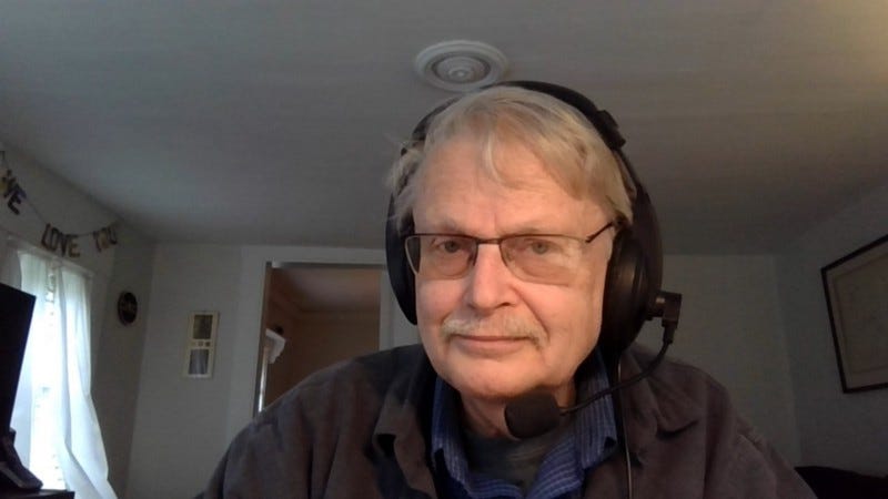 Image of counselor with headset.