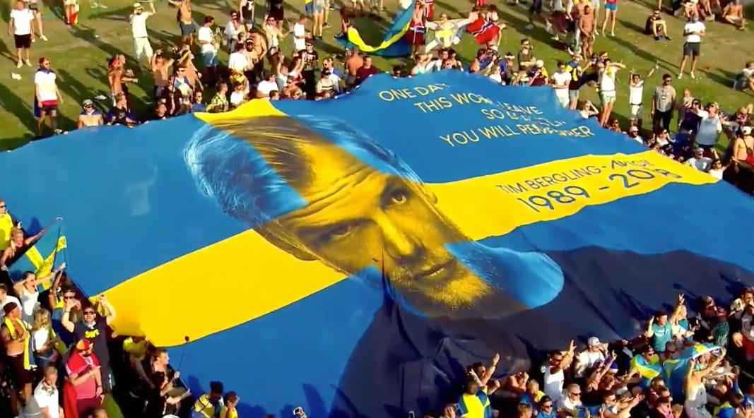 People of Tomorrow Remember Avicii with Huge Flag During Nicky Romero's Set  [WATCH] | Your EDM