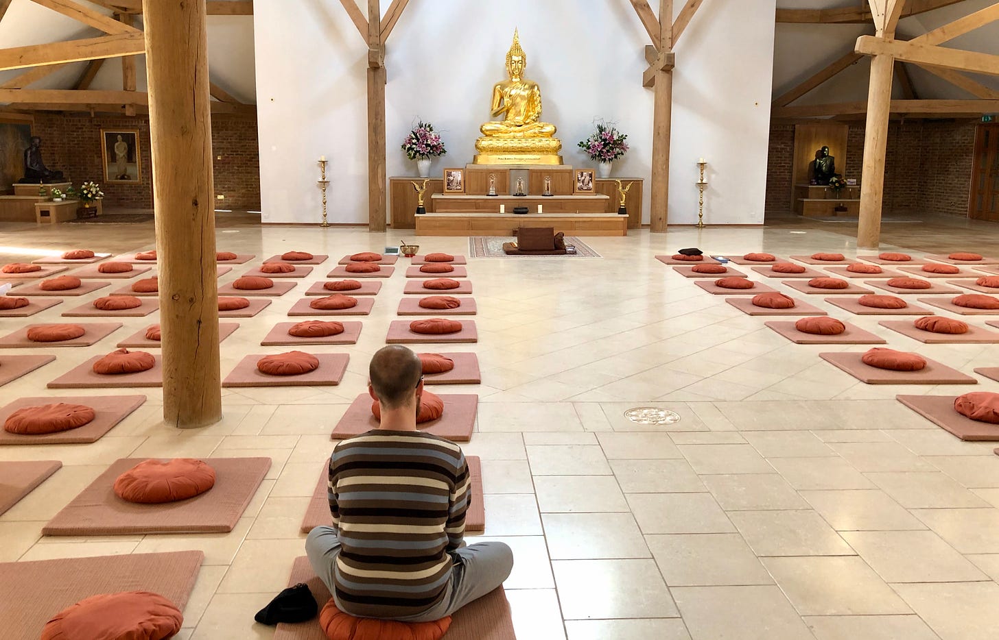 A man prays inside the temple