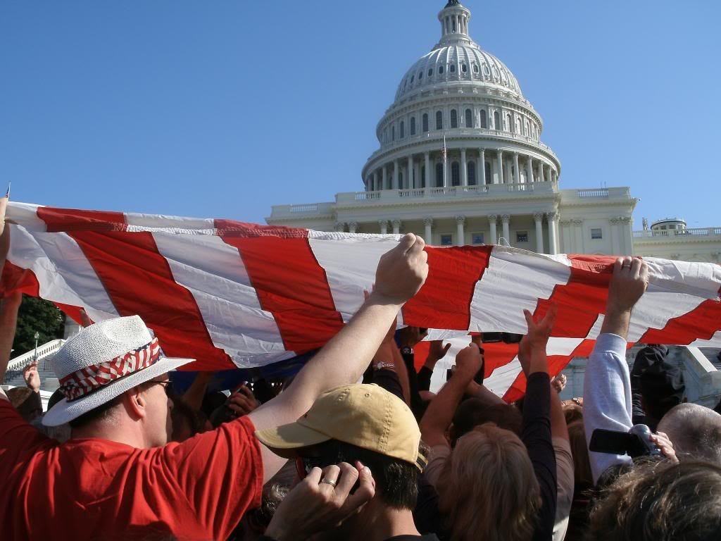 Passing the American flag overhead gave me an opportunity to take this shot with the Capitol dome in the background.