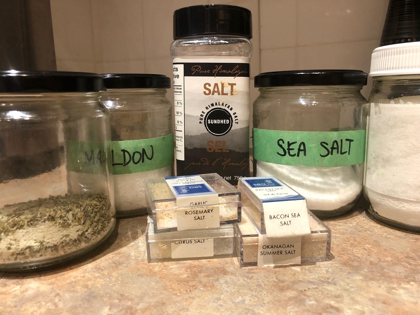 A photo showing a few different kinds of salt