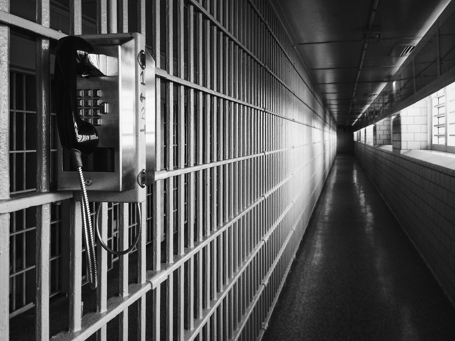 A photo of a phone inside a jail