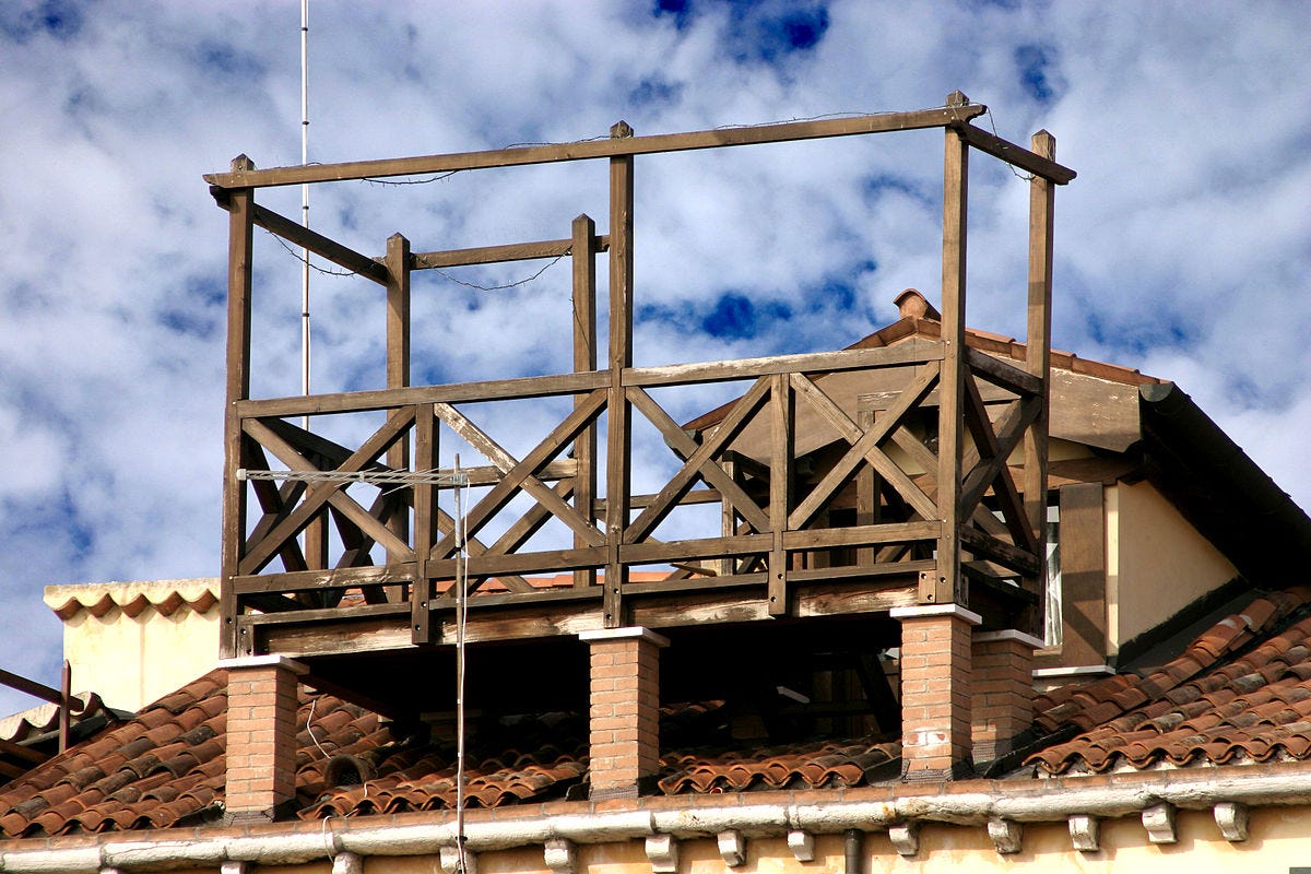 A roof terrace on top of an Italian roof